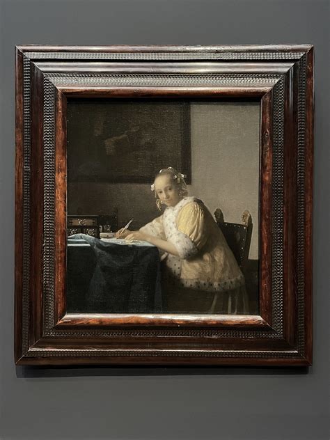 schrijvende vrouw in het geel|Lady Writing a Letter with her Maid